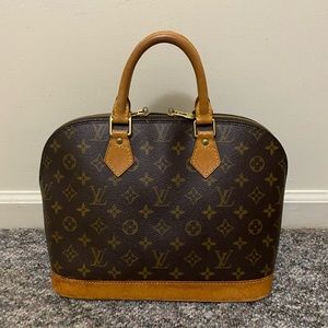 Authentic Louis Vuitton Alma Monogram Handbag